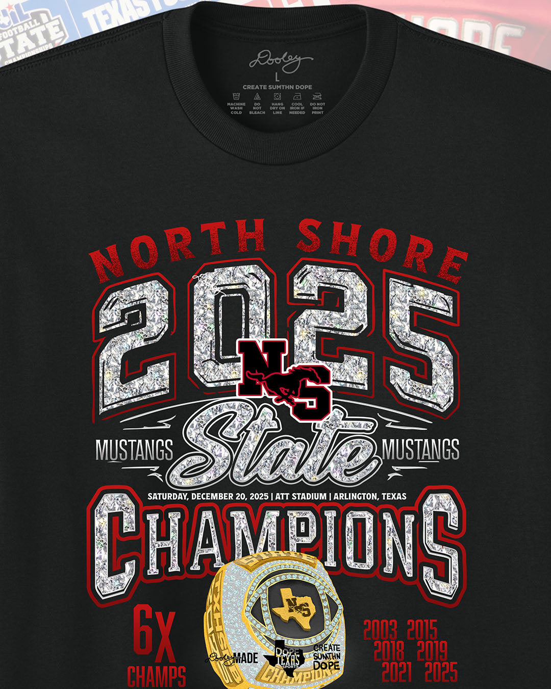 Zoomed Black Shirt with 'North Shore 2025 State Champions' text in diamonds and golden champion ring design with 6 time champions an and championship years (2003, 2015, 2018, 2019, 2021, 2025. Zoomed to show detail.