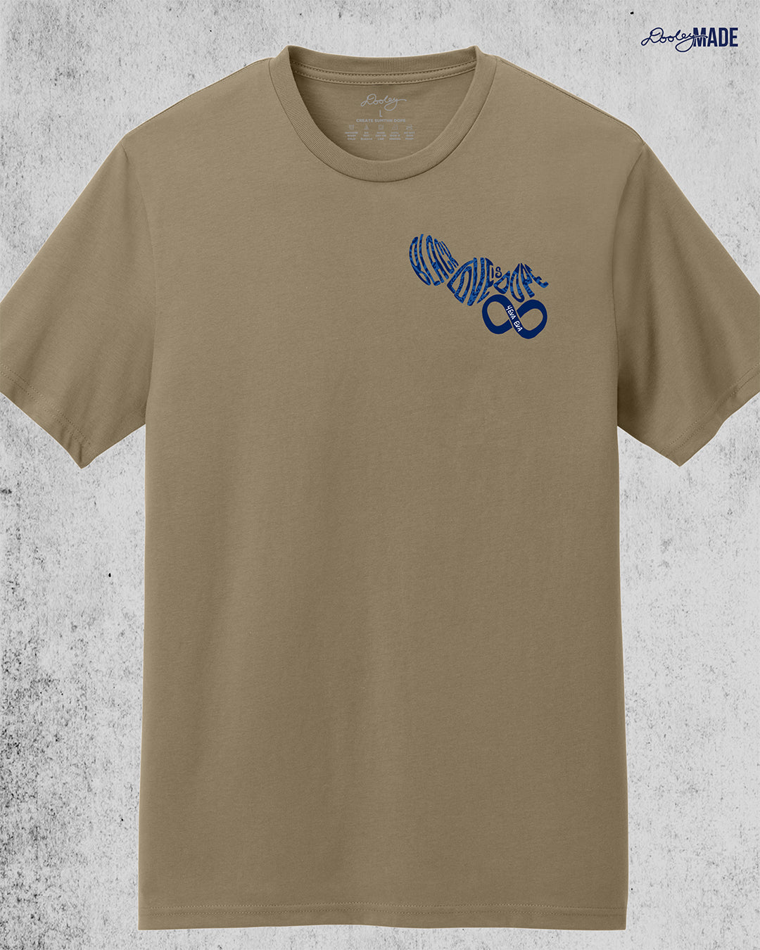 An image of the front of a desert tan colored shirt reading "Black Love is Dope" with an infinity symbol on the left chest in navy blue.