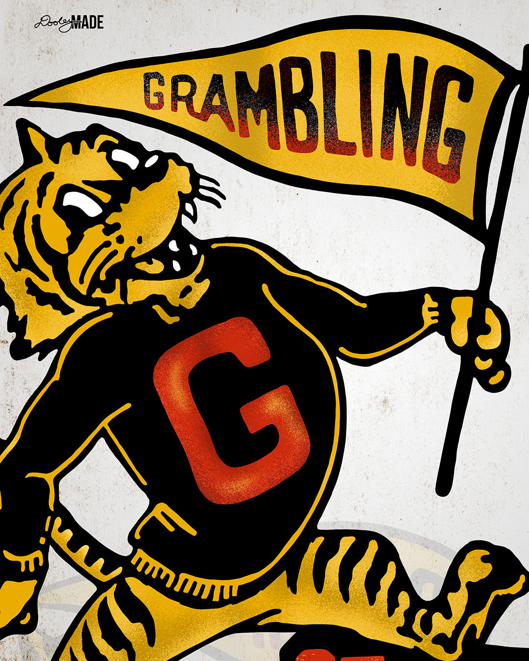 This is an image of  a retro-style design celebrating Grambling State University. The design includes a vintage illustration of a tiger mascot holding a yellow pennant that reads "Grambling" in bold letters. The tiger wears a shirt with a large red "G" and has a distressed, classic look. The background features a faint overlay of the same tiger mascot design for added texture with the Dooley Made logo.