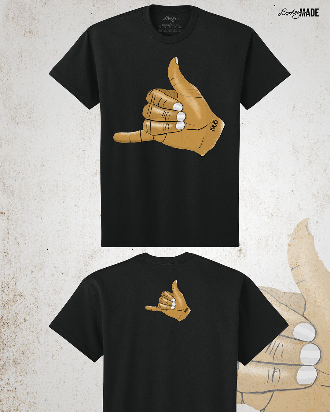 The front and back of a Black t-shirt with an old gold Alpha Phi Alpha Fraternity, Inc. "ICE" hand sign with "1906" text on the wrist. Image shows the design large on the front and smaller on the upper portion of the back.