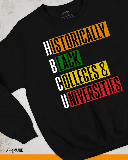 Black crewneck sweatshirt featuring bold block text reading "Historically Black Colleges & Universities" in red, yellow, green, and orange—HBCU pride apparel.