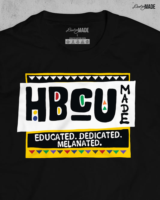 A premium black shirt featuring a bold HBCU Made 90s Martin Show themed design featuring the text "Educated, Dedicated, Melanated. The design is white, black, yellow, and various other vibrant colors.