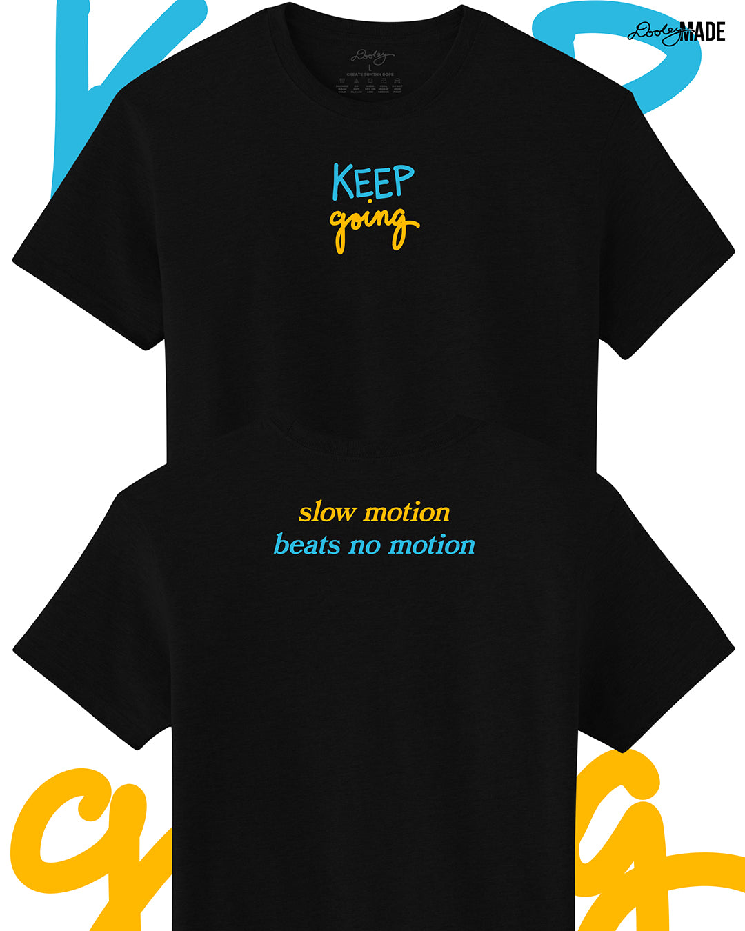 Heavyweight Black t-shirt with 'KEEP going' and 'slow motion beats no motion' text in blue and yellow on a white background. Shirts are stacked on each other vertically.