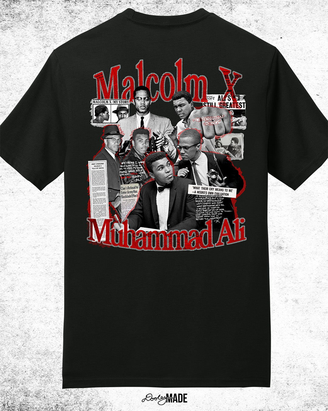 The back of a Black t-shirt featuring a collage of Malcolm X and Muhammad Ali with newspaper headlines and photos, with Malcolm X & Ali in bold red and white text. On a white background.