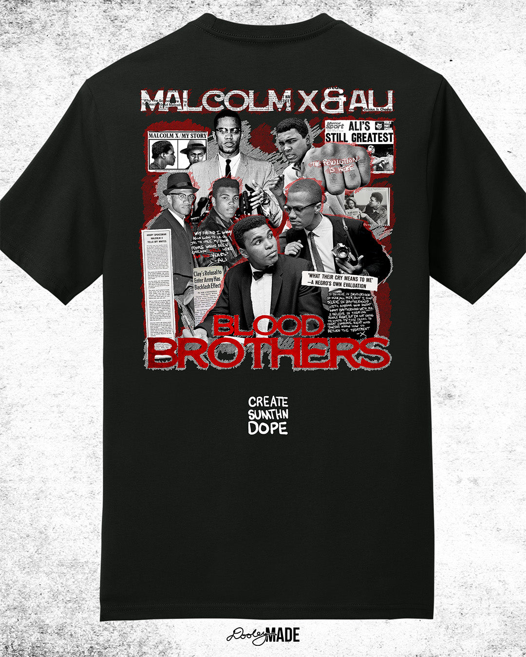 The back of a Black t-shirt featuring a collage of Malcolm X and Muhammad Ali with newspaper headlines and photos, titled 'Malcolm X & Ali: Blood Brothers' in bold red and white text.
