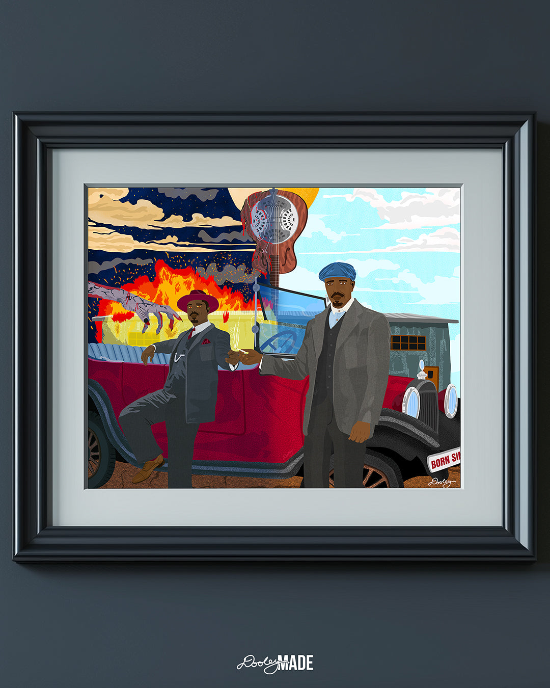 A zoomed in framed Illustration of Michael B. Jordan as The Smoke Stack Twins in the Sinners movie, showing them stand together in front of a vintage red car sharing a cigarette. Sammy’s split guitar divides night and day with one side of a building burning and the other side untouched in the background. A bloody, lifeless hand extends toward Stack as his eyes glow red. Wall art is on a wall blue-gray wall with board and batten.