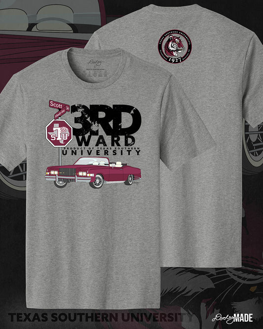 An image of the front and back of a heather gray Texas Southern University graphic tee shirt featuring a 3rd Ward University design and a maroon old school car with elbow rims. There is also a Scott St and Wheeler Ave street sign with a stop sign with the Texas Southern University logo on it. The back shows a circular print with the words Texas Southern University Established 1927 Houston, Tx  around the border with a stylized tiger inside of it.