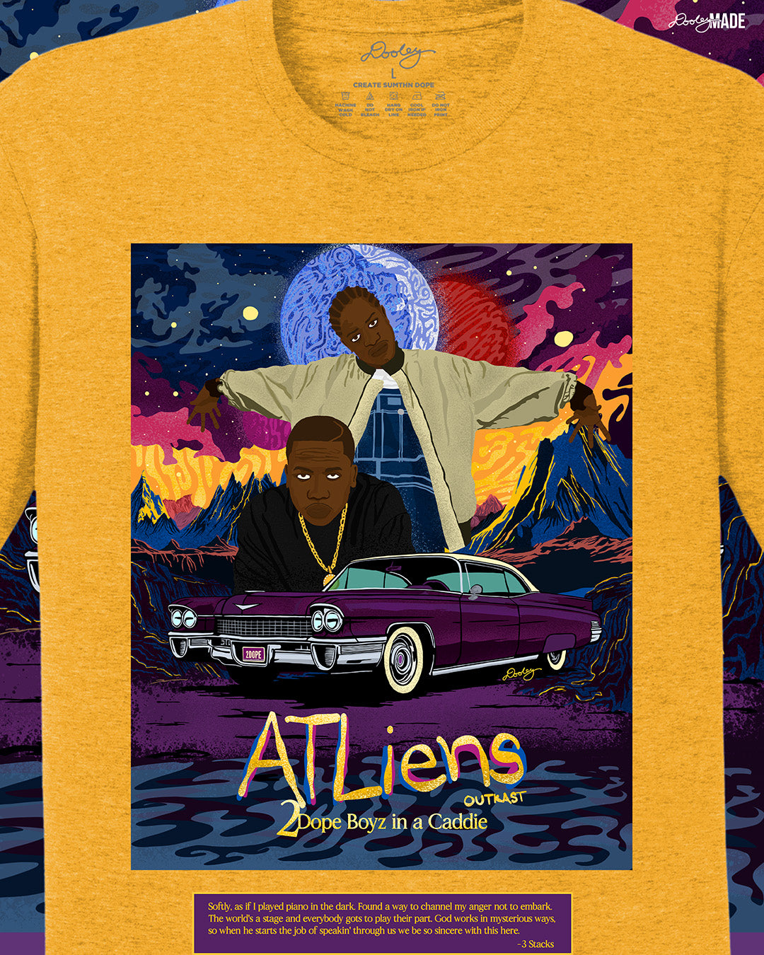 A zoomed heather gold OutKast shirt featuring a custom out of this world illustration and an old school Cadillac, capturing the essence and colorful complexity of OutKast's extra-terrestrial rhymes. There is also an Andre 3000 quote from the song "2 Dope Boys in a Cadillac."