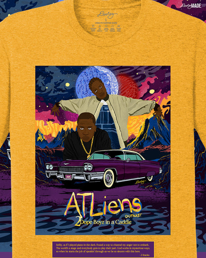 A zoomed heather gold OutKast shirt featuring a custom out of this world illustration and an old school Cadillac, capturing the essence and colorful complexity of OutKast's extra-terrestrial rhymes. There is also an Andre 3000 quote from the song "2 Dope Boys in a Cadillac."