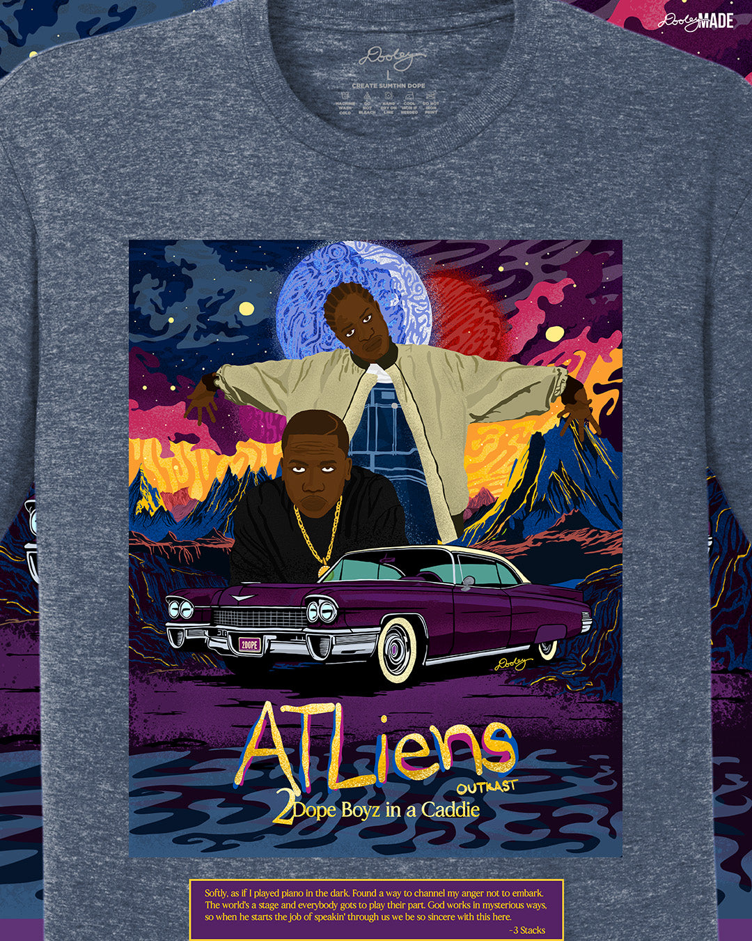 A zoomed heather navy OutKast shirt featuring a custom out of this world illustration and an old school Cadillac, capturing the essence and colorful complexity of OutKast's extra-terrestrial rhymes. There is also an Andre 3000 quote from the song "2 Dope Boys in a Cadillac."