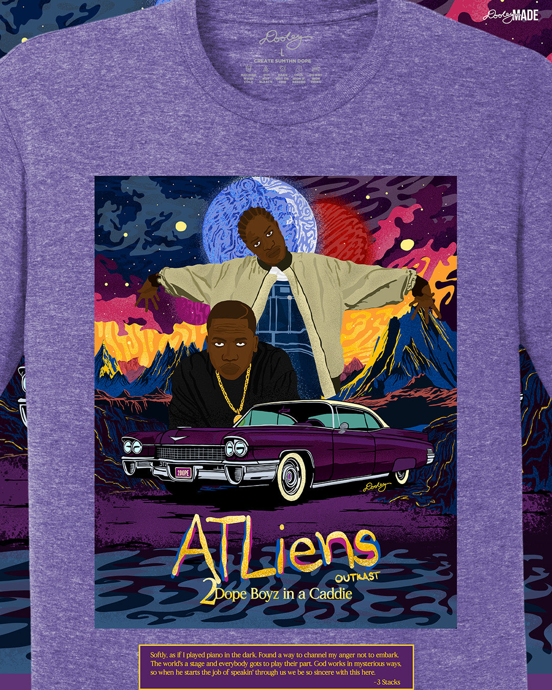 A zoomed in heather purple OutKast shirt featuring a custom out of this world illustration and an old school Cadillac, capturing the essence and colorful complexity of OutKast's extra-terrestrial rhymes. There is also an Andre 3000 quote from the song "2 Dope Boys in a Cadillac."