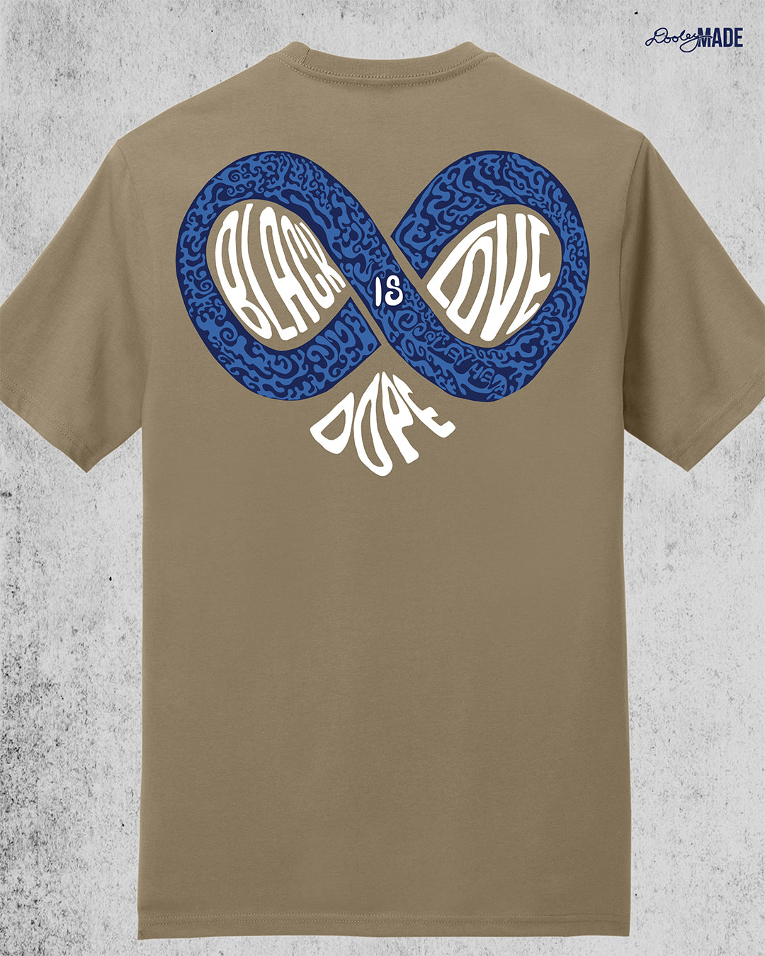 An image of the back of a desert tan colored shirt reading "Black Love is Dope" featuring an infinity symbol that combines with the word "Dope" to make the shape of a heart.  