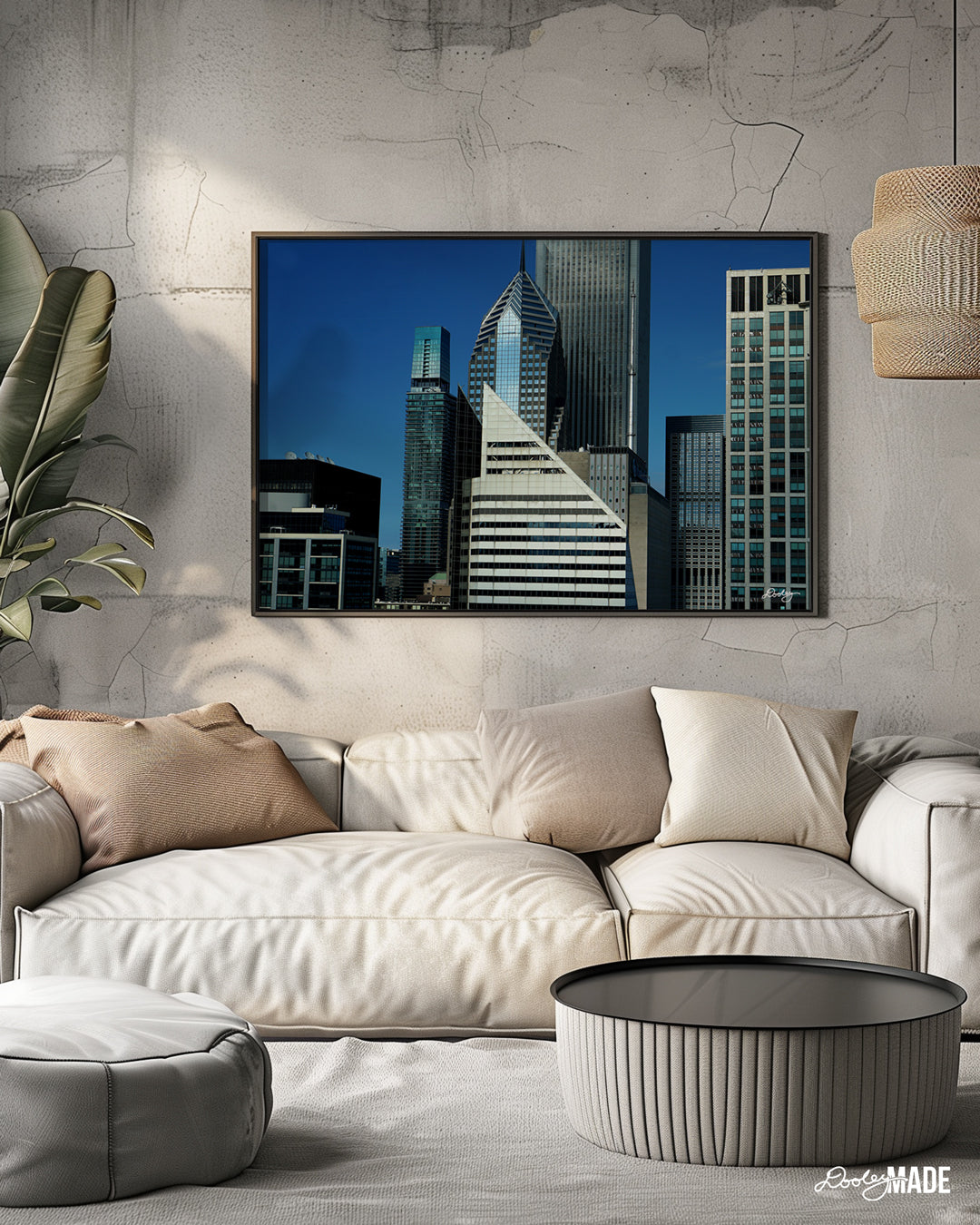 A beautiful picture showcasing a cluster of towering skyscrapers in Chicago, with a vibrant blue sky as a backdrop on the wall in a Boho Chic, tan room. The buildings exhibit a variety of architectural styles, with sleek glass facades and modern designs dominating the skyline.