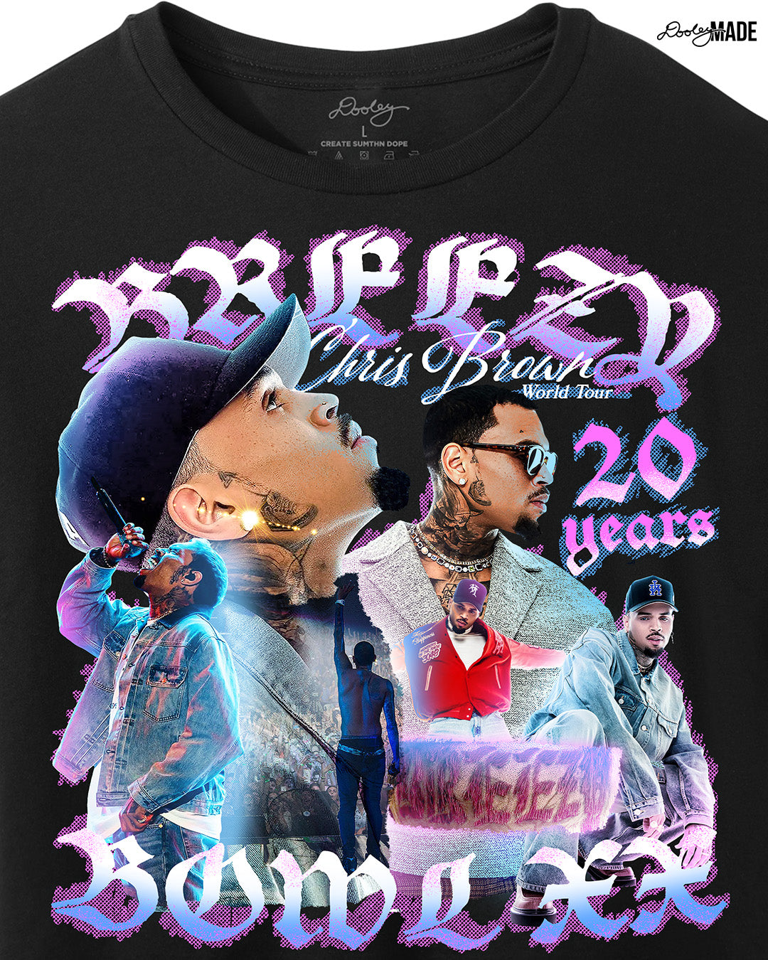 A zoomed Black crop top t-shirt with a pink, blue, and white graphic that says 'Breezy Bowl XX,' 'Chris Brown World Word Tour' and '20 Years.' The graphic also features a collection of stylized Chris Brown photos with pink and blue highlights. 