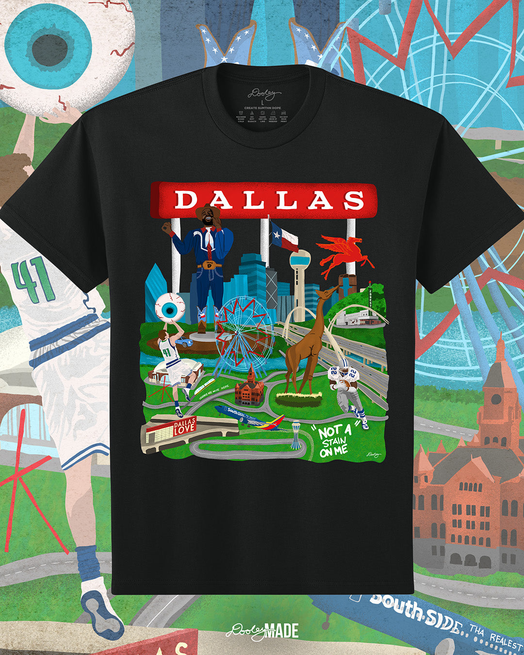 The front of a Dallas themed shirt with the text "Dallas" in red and illustrated Dallas landmarks like the Dallas skyline, "Triple D Big Tex and the Texas Star Ferris Wheel at the State Fair of Texas, legendary Dallas athletes, Dallas Love Field Airport, Dallas Zoo giraffe statue, and the Margaret Hunt Hill Bridge. Background is colorful.