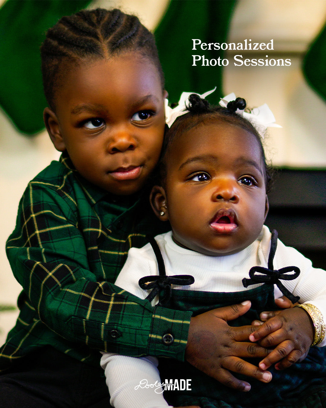 Two brown skinned children posing hugging wearing green plaid clothing A brown skinned child wearing a green plaid shirt with 'Personalized Photo Sessions' text advertising Personalized Photo Sessions in the Dallas DFW Metroplex by Dooley Made.