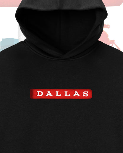 The front of a Dallas themed heavyweight 340 gsm hoodie called "Dallas Love" with 'DALLAS' printed on the front and a colorful background zoomed in.