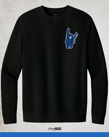 A premium black Phi Beta Sigma crewneck sweater featuring the Phi Beta Sigma hand sign in blue on the left chest with "Phi Beta Sigma" written in white on the right. 