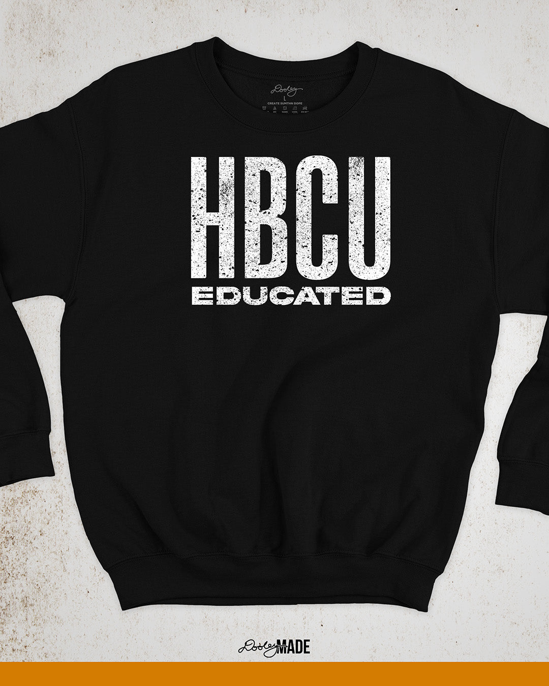 An image of a black HBCU Educated (Historically Black Colleges & Universities) crewneck sweater with white weathered print with a grunge texture. Perfect for students and alumni.