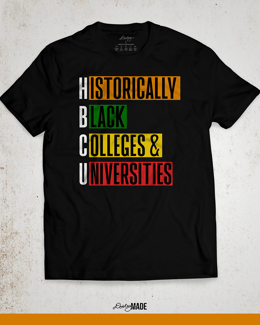 Black shirt featuring bold block text reading "Historically Black Colleges & Universities" in red, yellow, green, and orange—HBCU pride apparel.