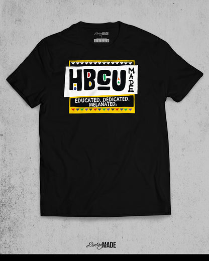 A premium black shirt featuring a bold HBCU Made 90s Martin Show themed design featuring the text "Educated, Dedicated, Melanated. The design is white, black, yellow, and various other vibrant colors.