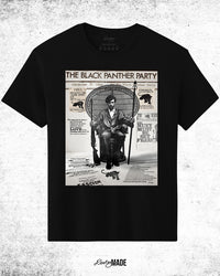 A graphic tee shirt with an image of Huey P. Newton artwork featuring the Black Panther Party's 10 Point Program, a poster that hung inside the door of the Chicago Chapter headquarters, the quote "I believe what motivates people is not great hate, but great love for other people," and other historical memorabilia.