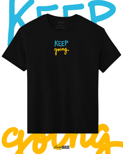 Heavyweight Black t-shirt with 'KEEP going' text in blue and yellow on a white background with the same 'KEEP going' text.