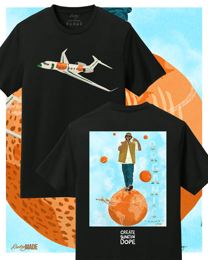 A black Larry June themed graphic t-shirt featuring a private jet with orange and green accents on the front. The back showcases a Larry June illustration of him standing on an orange planet with floating orange planets, alongside the text "Organic Planet" and "Create Sumthin Dope." Bold streetwear design blending creativity, luxury, and hip-hop culture.