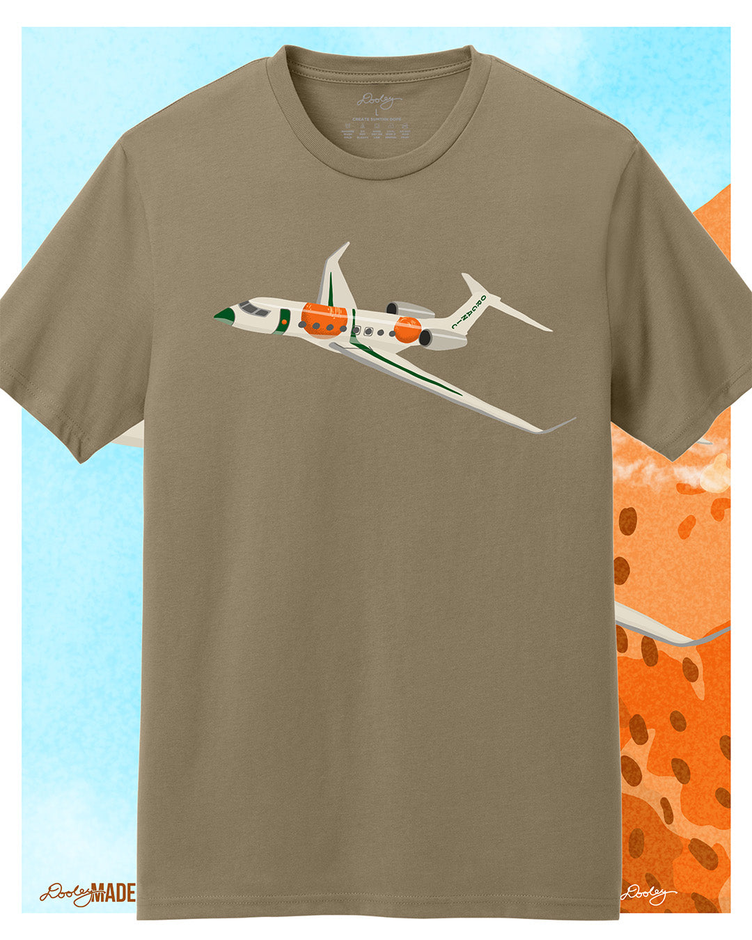 A khaki tan Larry June themed graphic t-shirt featuring a private jet with orange and green accents on the front. Bold streetwear design blending creativity, luxury, and hip-hop culture.