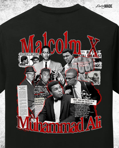 The back of a Black t-shirt featuring a collage of Malcolm X and Muhammad Ali with newspaper headlines and photos, with Malcolm X & Ali in bold red and white text. On a white background. Zoomed to show detail.