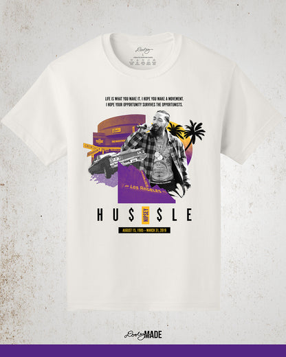 Vintage white Nipsey Hussle graphic t-shirt featuring “Sunsets on Slauson” artwork in LA purple and gold, depicting The Marathon Store on Slauson, a Chevy with NIPSEY plates, the Los Angeles Theatre marquee, a sunset, and palm trees—perfect hip-hop streetwear and Los Angeles apparel