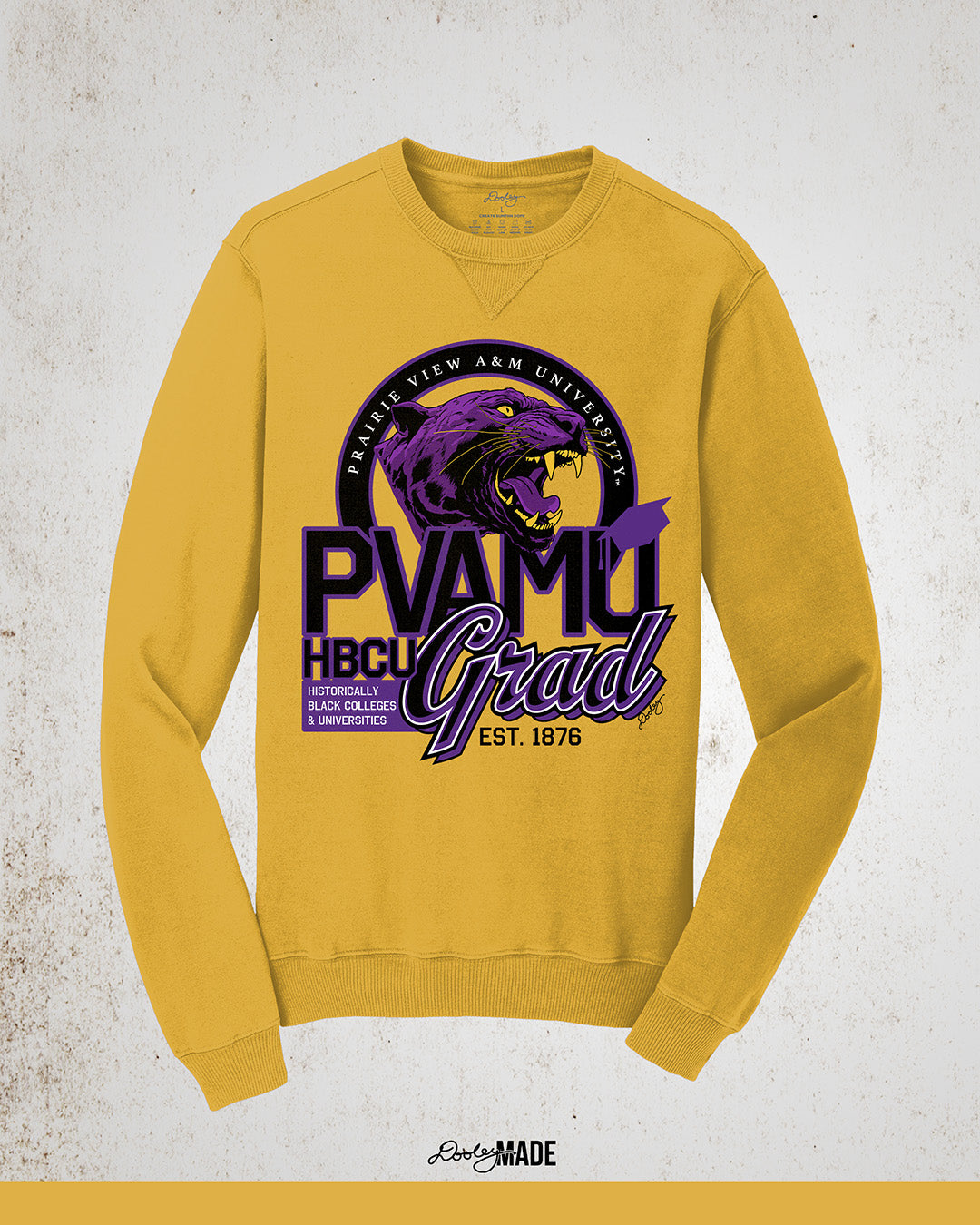 A vintage gold Prairie View A&M graduation crewneck sweatshirt featuring a roaring panther surrounded by a circular frame with Prairie View A&M University inside of it, and the words "PVAMU Grad" next to Historically Black Colleges & Universities.
