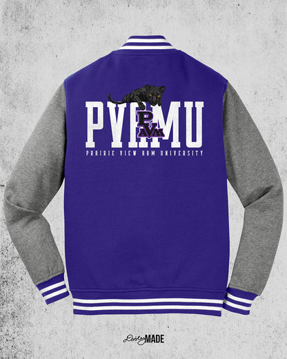 Image of a purple and heather gray Prairie View A&M Fleece Varsity Letterman Jacket with print of a black panther laying atop 'PVAMU' text, with PVAM Logo overlayed, and 'Prairie View A&M University' text underneath.