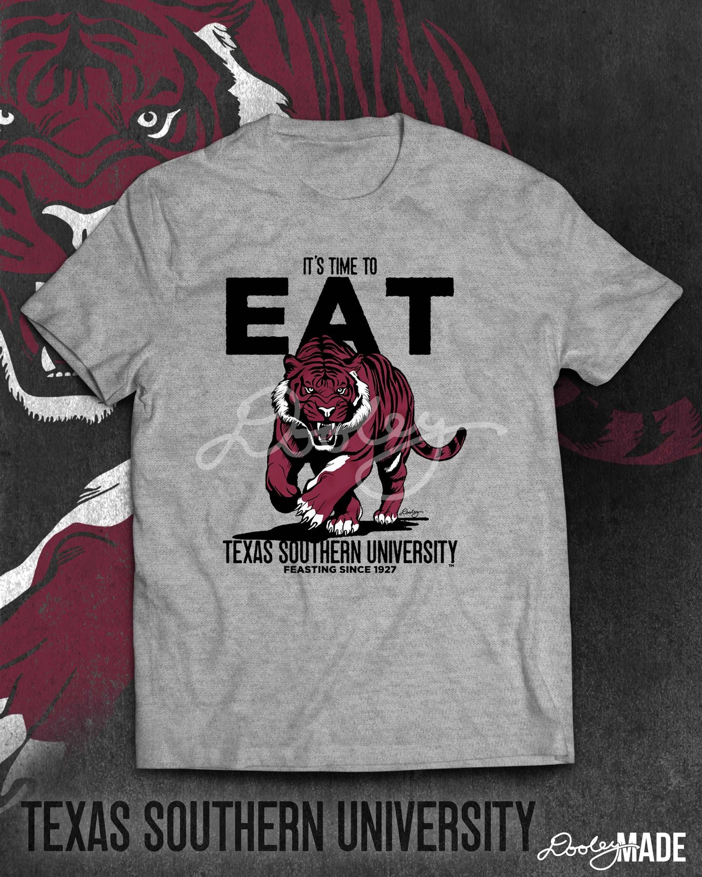 Image of a heather grey Texas Southern University shirt with the words "It's Time to Eat" in bold and a prowling aggressive maroon tiger. The words "Texas Southern University" are below the tiger followed by "Feasting since 1927."
