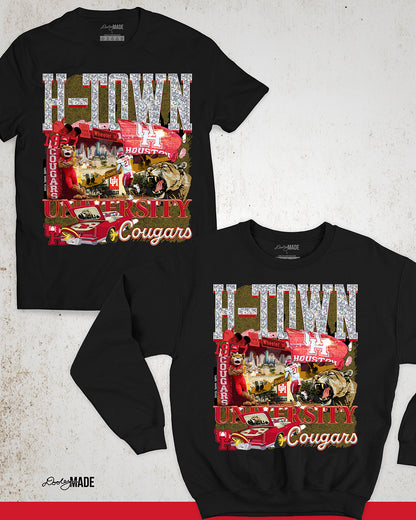 A black University of Houston themed shirt and crewneck sweater featuring a vibrant HTOWN University graphic collage with "H-TOWN" text in diamonds, Cougar mascot, players, city skyline, and classic lowrider in a vibrant collage design.